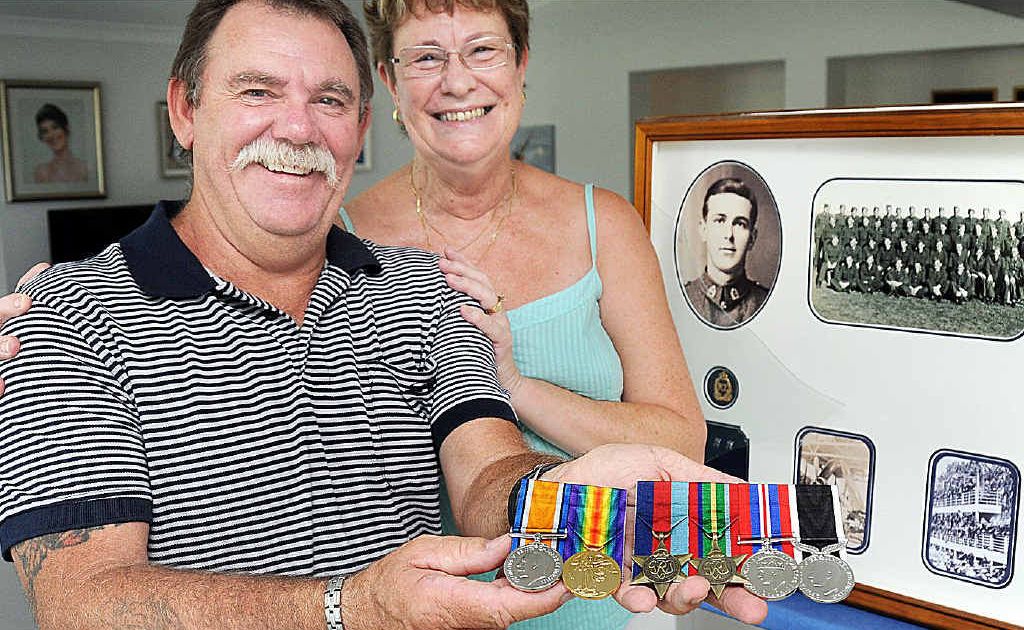Peter Crane (medal mounter) presented Laraine O’Leary with replica war medals after hers were stolen two weeks ago.